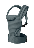 The Armadillo Baby Carrier in Lou Blue worn by Rumer Willis