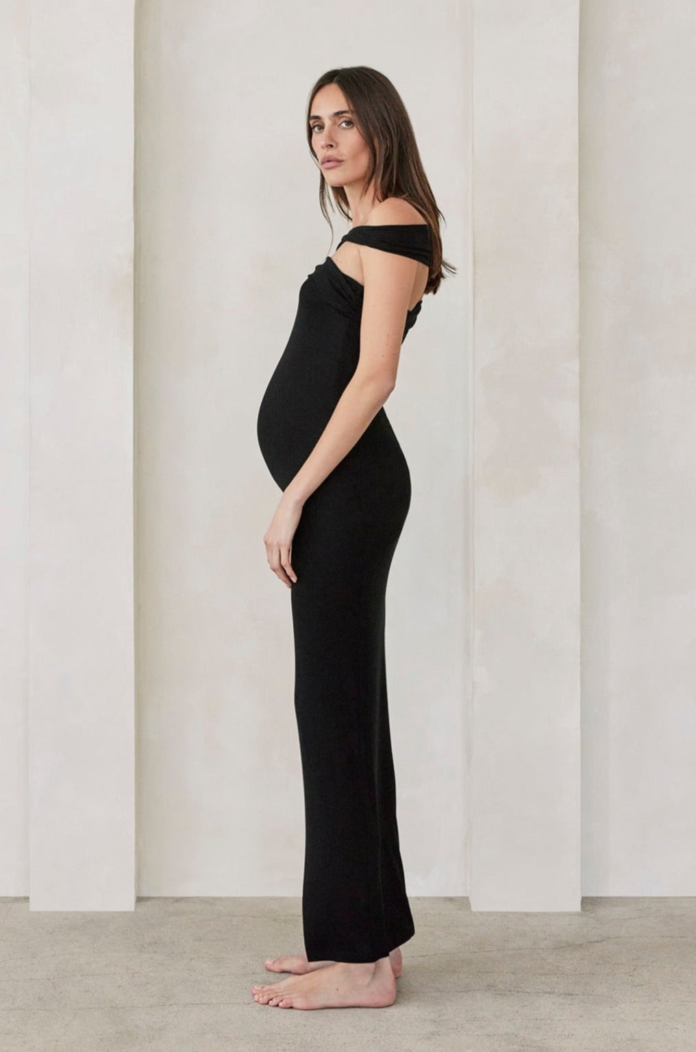 Bumpsuit Maternity Cross Strap Evening Dress in Black