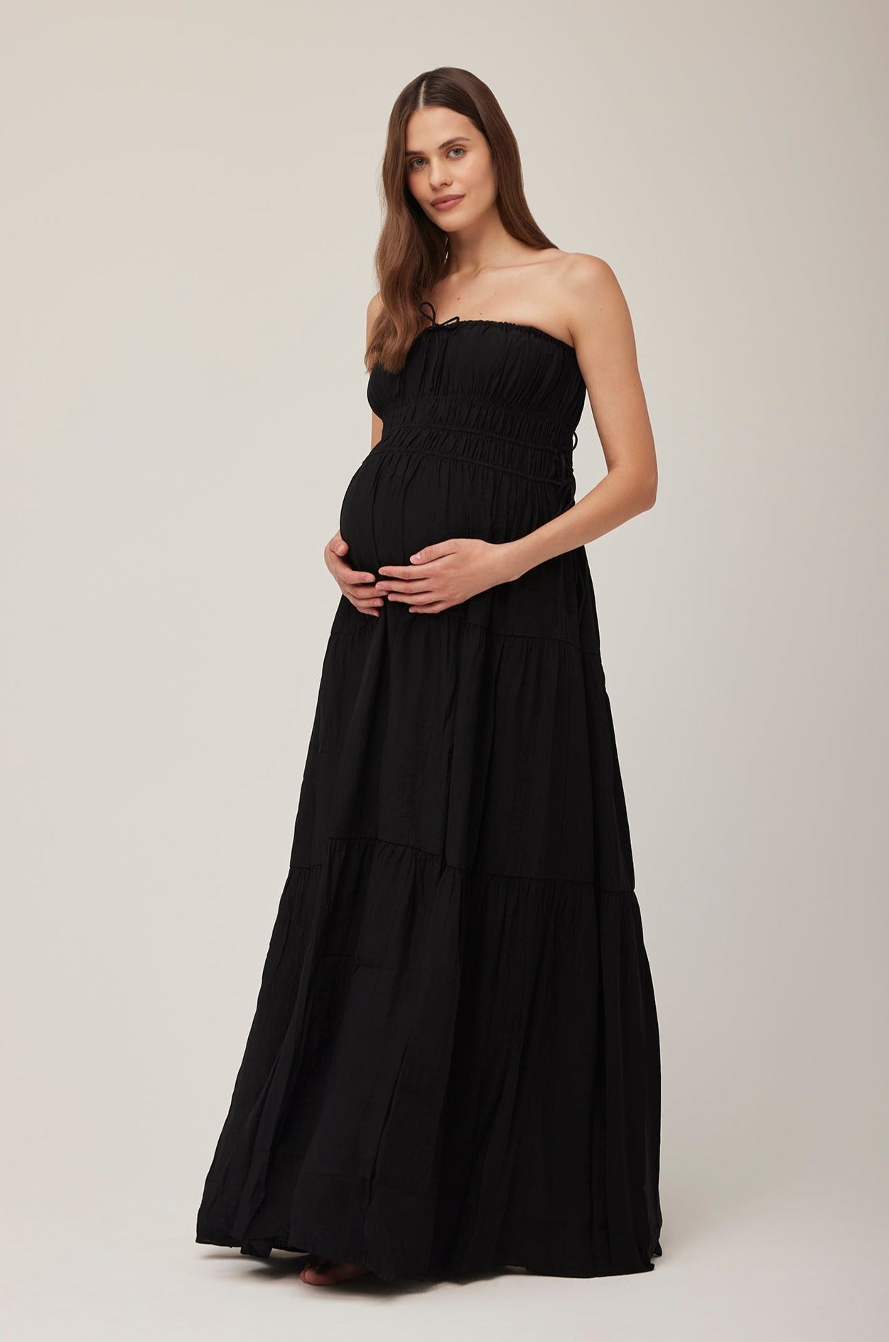 Bumpsuit Maternity Georgia Fowler the shirred strapless gown in black