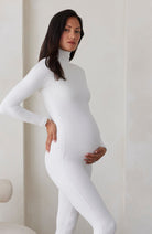 Bumpsuit Maternity the penelope turtleneck long sleeve jumpsuit in ivory