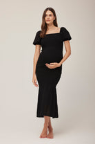 Bumpsuit Maternity Vacation Collection feat. Georgia Fowler the Shirred Puff Sleeve Dress in Black