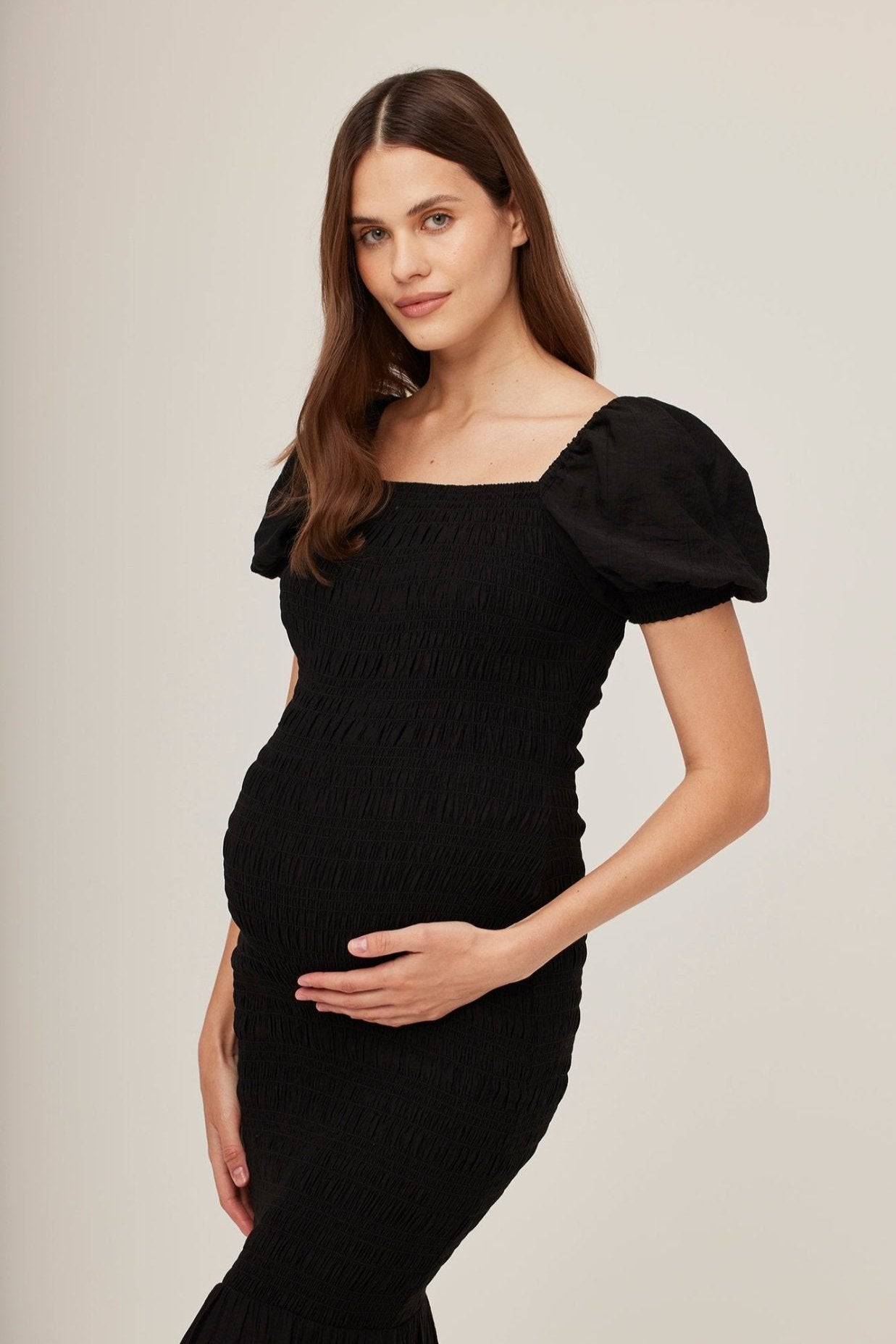 Bumpsuit Maternity Vacation Collection feat. Georgia Fowler the Shirred Puff Sleeve Dress in Black