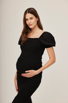 Bumpsuit Maternity Vacation Collection feat. Georgia Fowler the Shirred Puff Sleeve Dress in Black