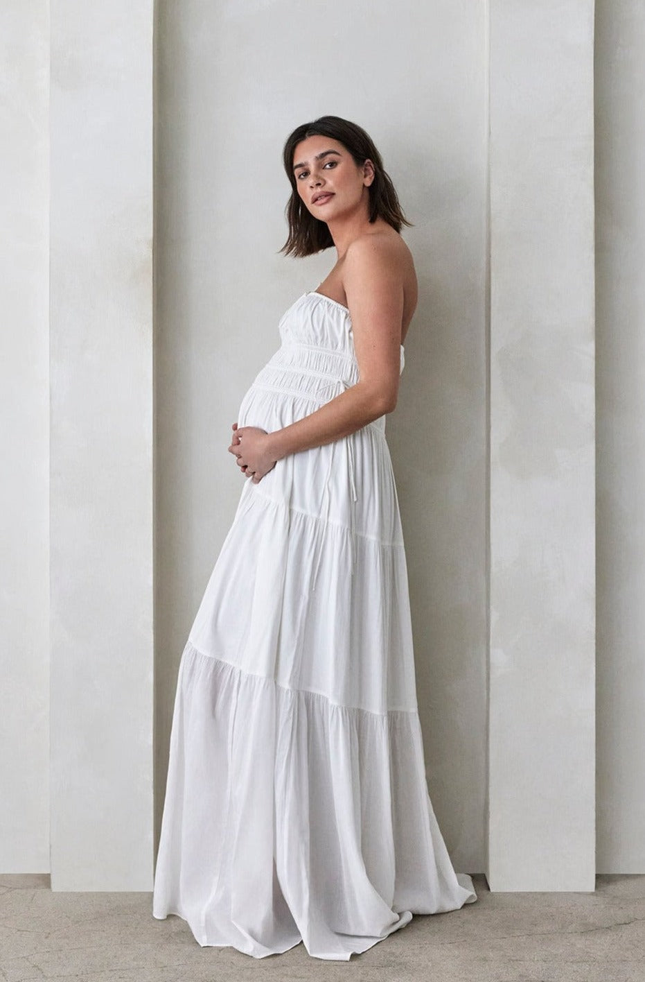 Bumpsuit Maternity Georgia Fowler the shirred strapless gown in white