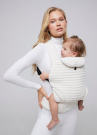 the armadillo baby carrier in cloud bumpsuit vita sidorkina