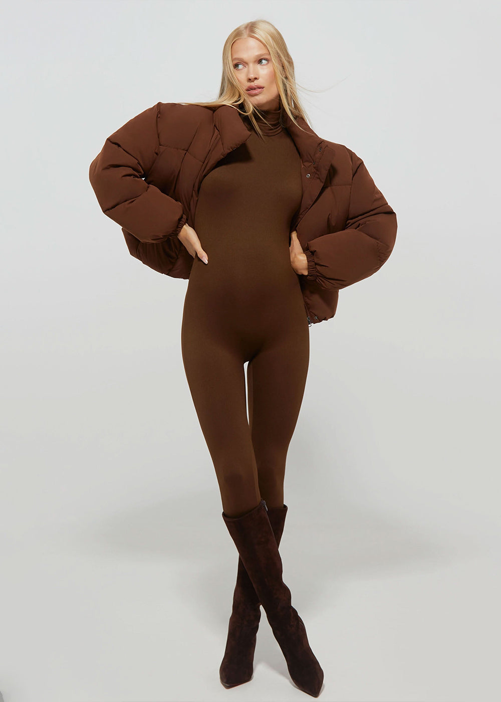 Bumpsuit Maternity Cropped Puffer Jacket in Chocolate worn by Vita Sidorkina