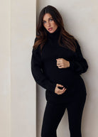 cozy knit turtleneck sweater and flare pant in black