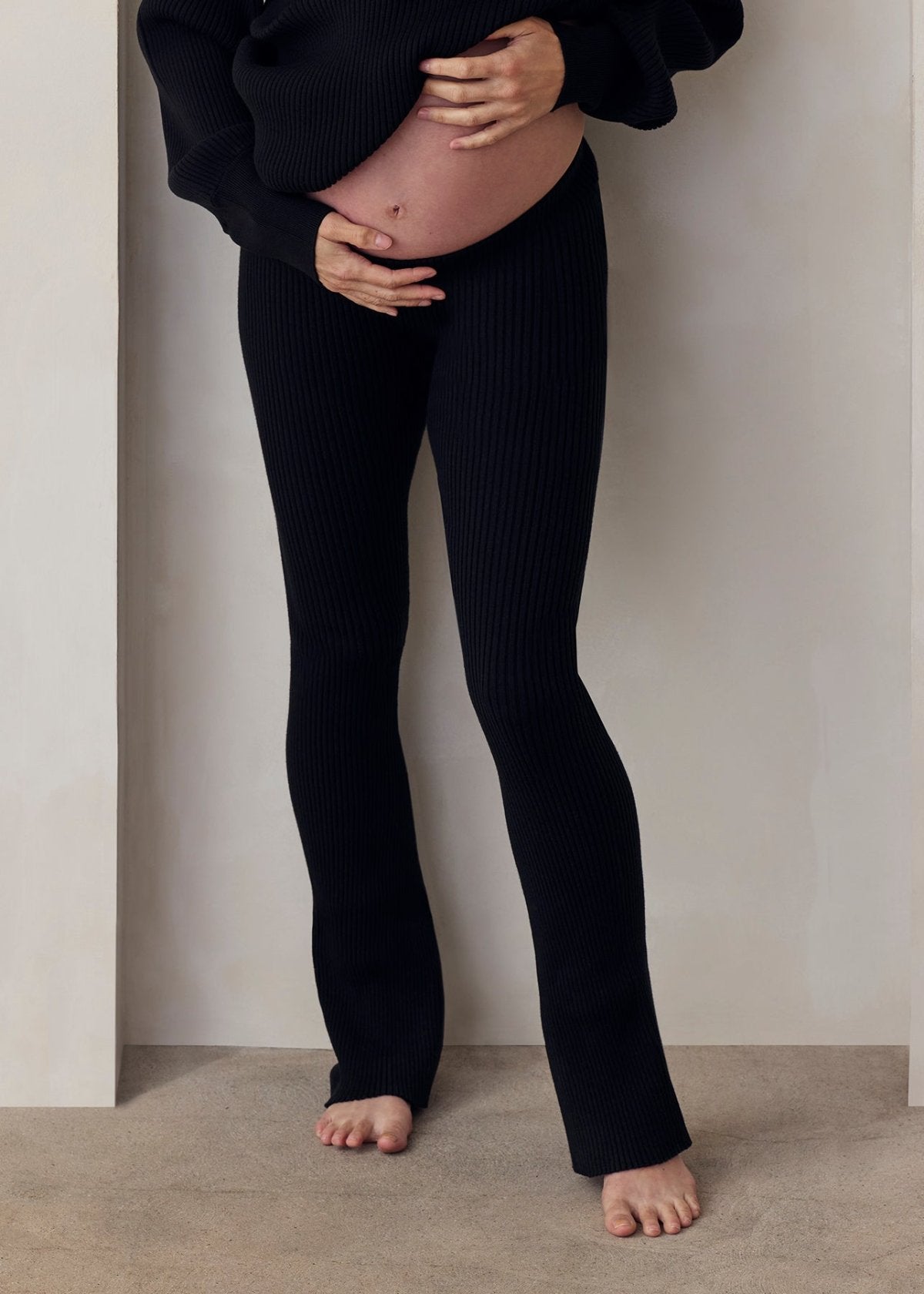 cozy knit turtleneck sweater and flare pant in black