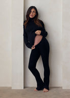 cozy knit turtleneck sweater and flare pant in black