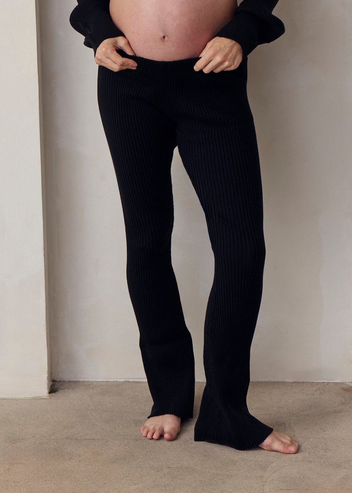 cozy knit turtleneck sweater and flare pant in black