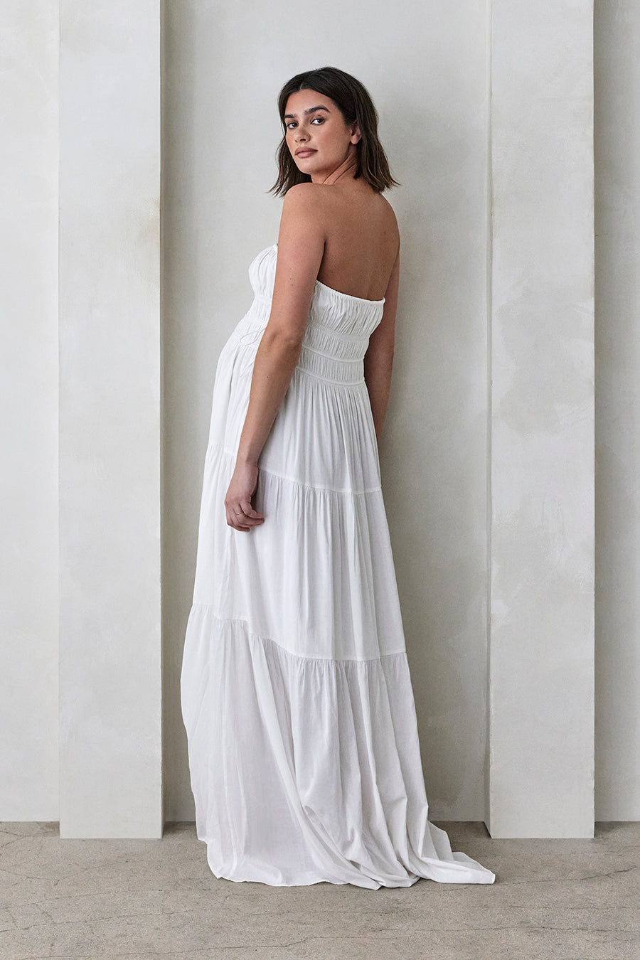 Bumpsuit Maternity Georgia Fowler the shirred strapless gown in white