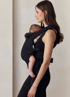 the armadillo baby carrier in black boucle