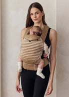 the armadillo baby carrier in dune velvet 