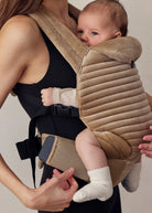 the armadillo baby carrier in dune velvet 