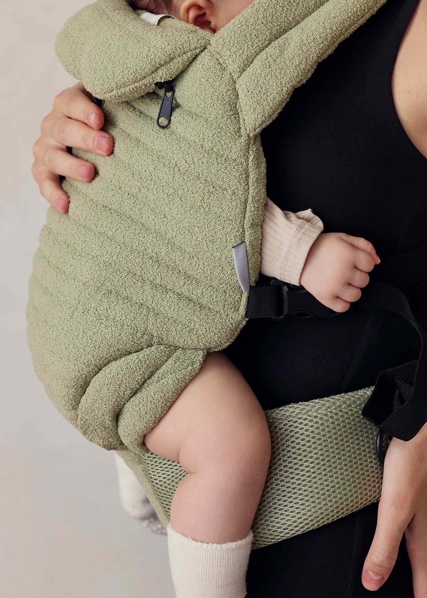 the armadillo baby carrier in matcha