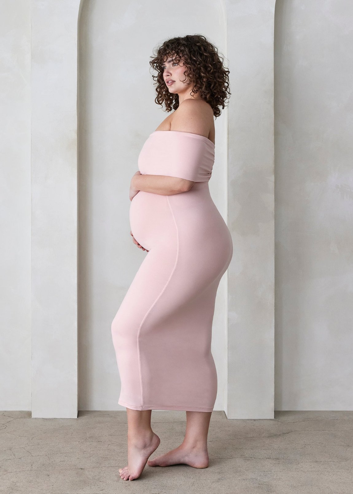 The Bumpsuit Maternity The Bianca Off Shoulder Maxi Dress in Dusty Pink