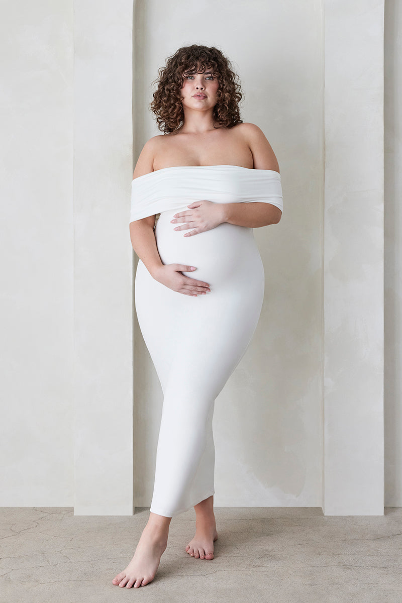 Bumpsuit Maternity The Bianca Off Shoulder Evening Dress in Ivory