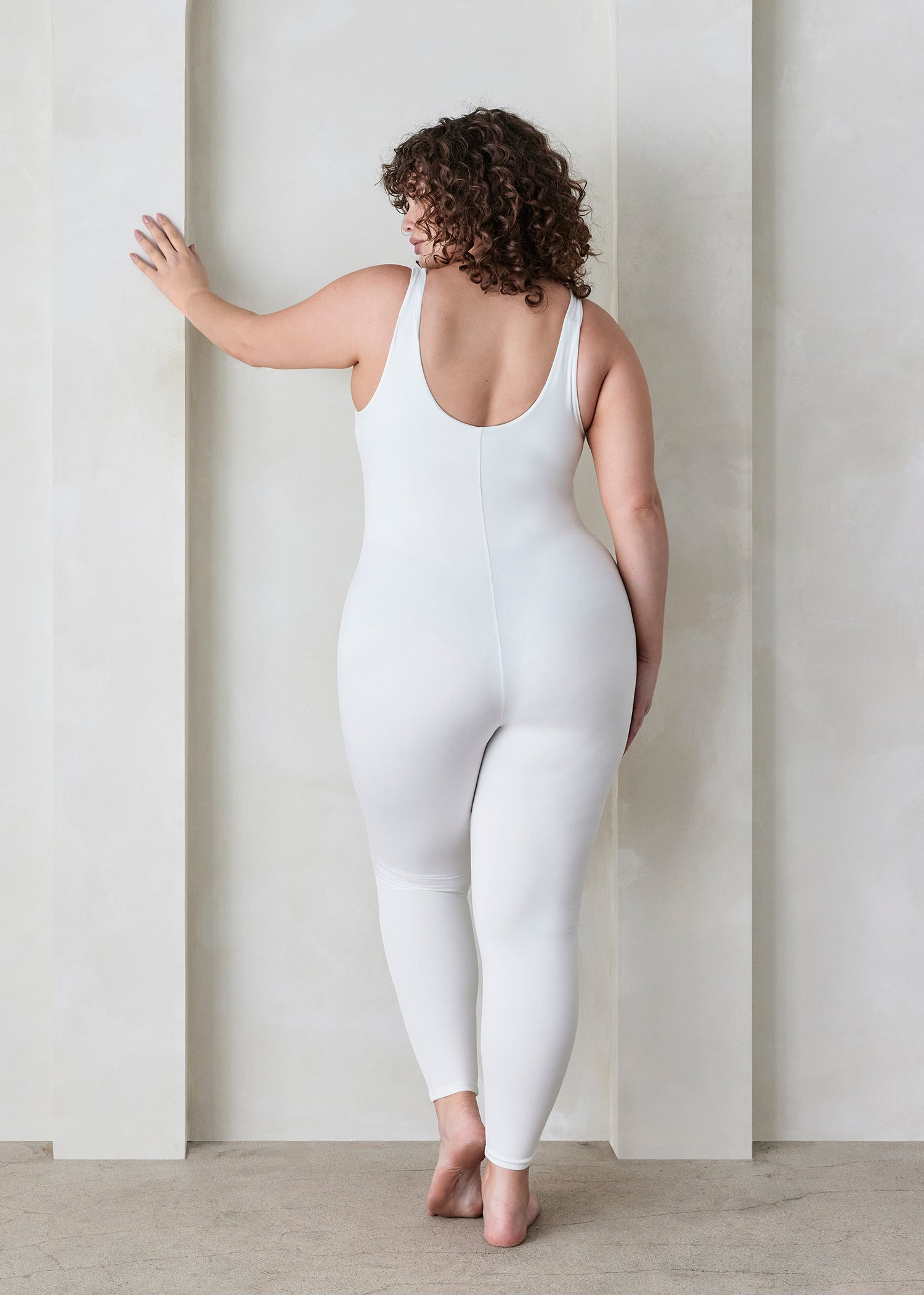 Bumpsuit Maternity The Lucy Sleeveless Jumpsuit in Ivory