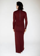 the monica turtleneck long sleeve maxi dress with side slit in burgundy