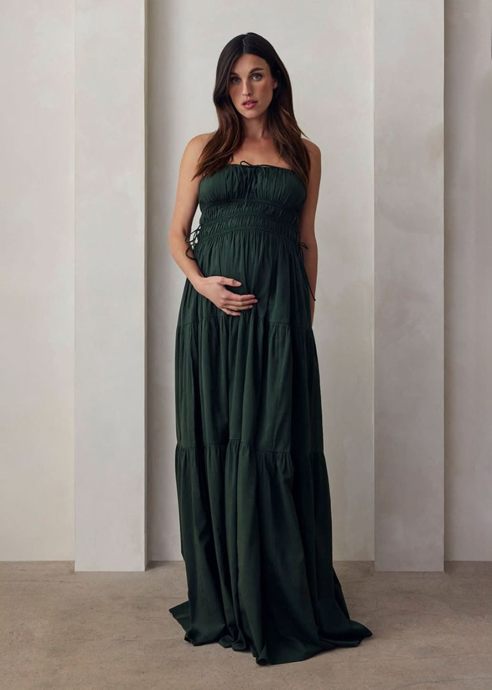 the bumpsuit maternity shirred strapless floor length gown in forest green