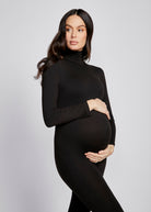 Bumpsuit Maternity the penelope turtleneck long sleeve jumpsuit in black