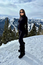 the penelope turtleneck long sleeve unitard in black