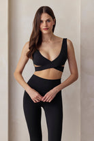 perfect movement wrap bra black bumpsuit activewear