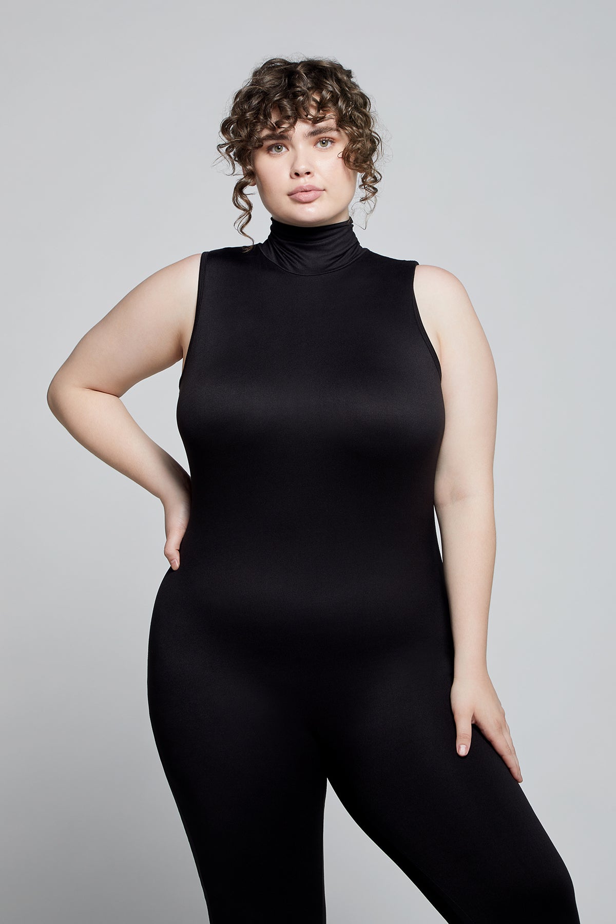 The Stevie Sleeveless Maternity Turtleneck Jumpsuit in Black