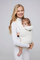 the armadillo baby carrier in cloud by bumpsuit